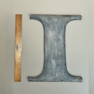 Large Antique wooden letter “I” from old restaurant signage